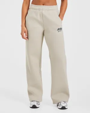 Ventilated Cups Extra Padding Option Balancing AYBL Sports Club Oversized Straight Leg Joggers - Sand/Navy