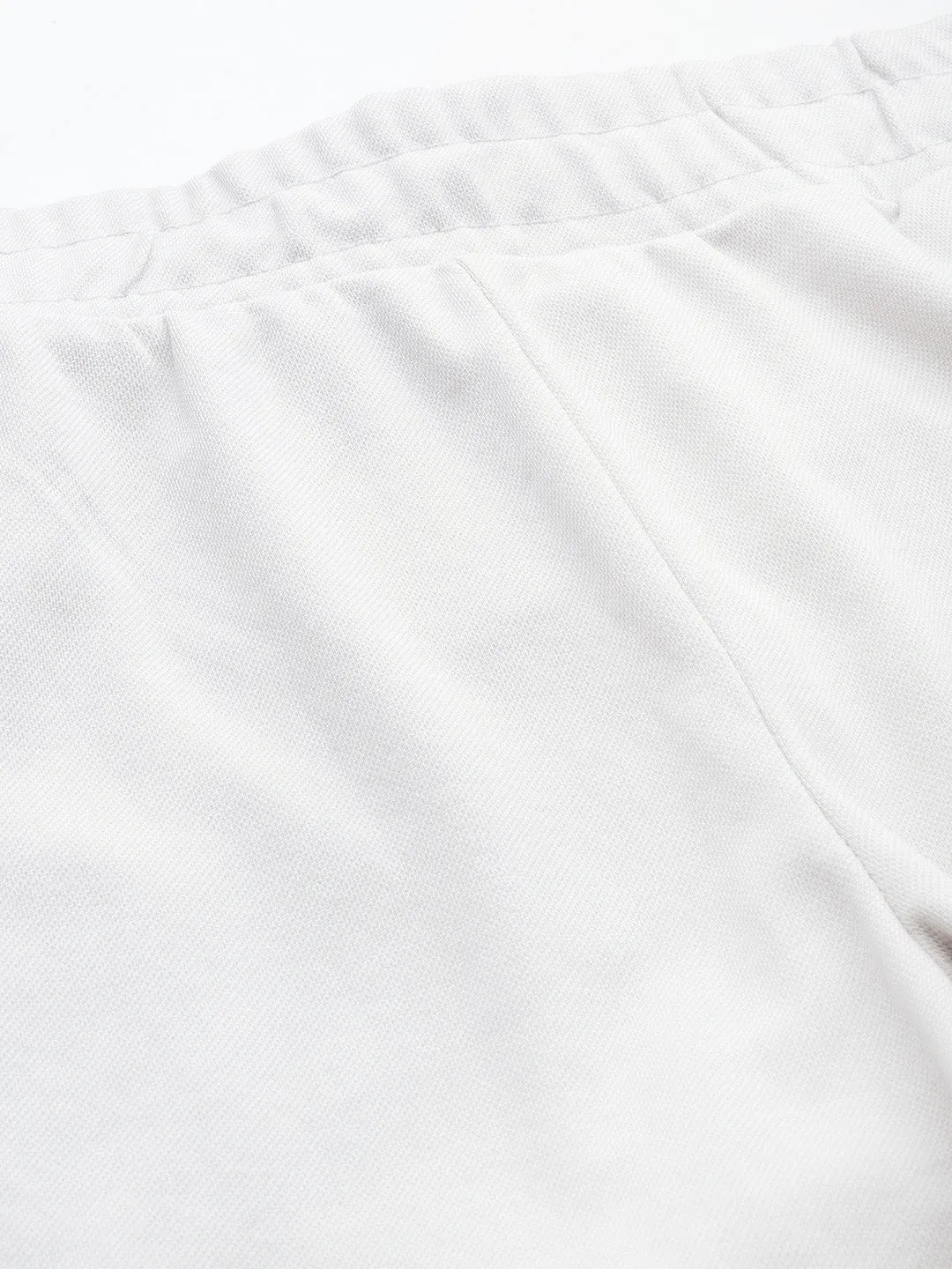 LightweightConstruction Alcis Women Off White Solid Slim Fit Track Pants