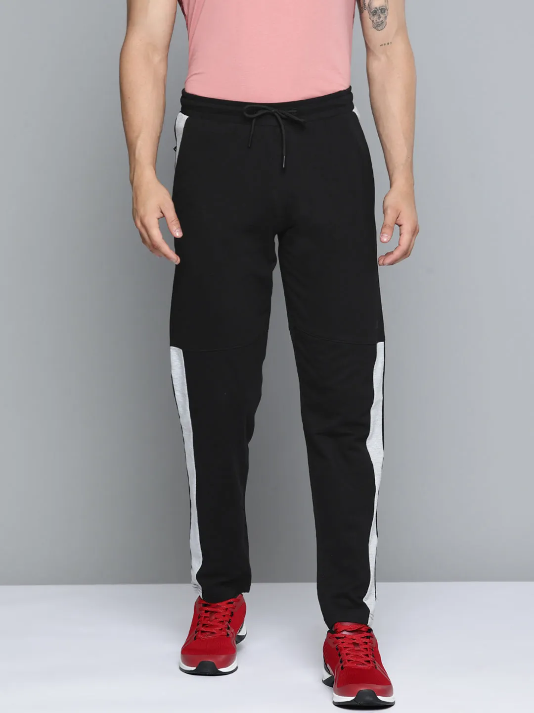 Alcis Men Black Solid Slim Fit Track Pants Movement Ease Belt loops