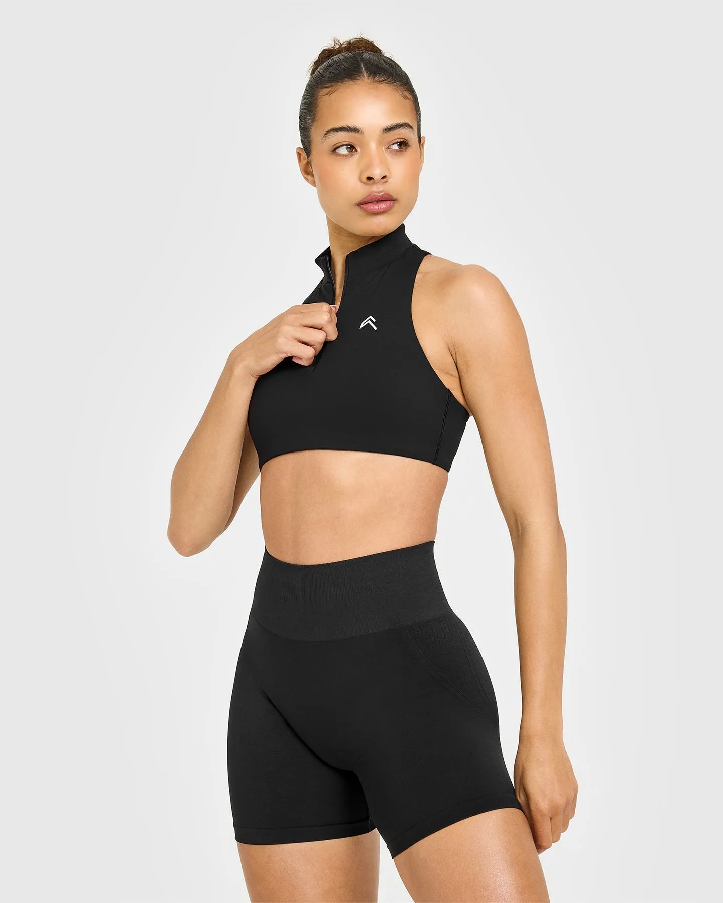EasyLift? Zip High Neck Sports Bra | Black Unit Embroidered seams