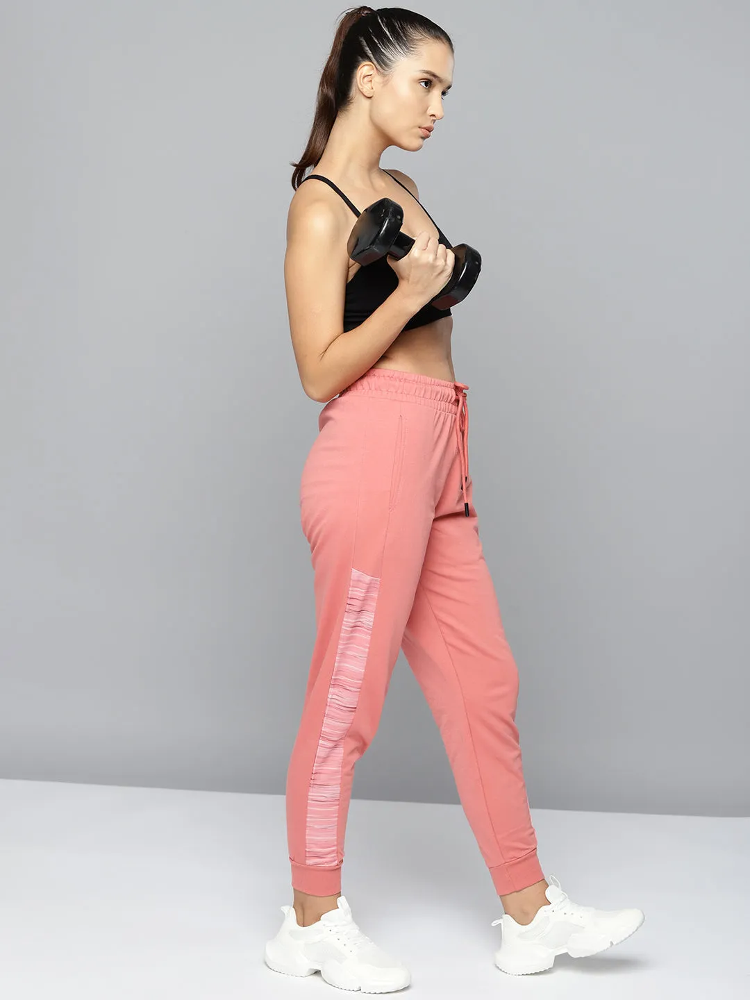Adjustable Drawcord Sweat Wicking Liner Alcis Women Peach-Coloured Solid Slim-Fit Training Joggers with Side Taping