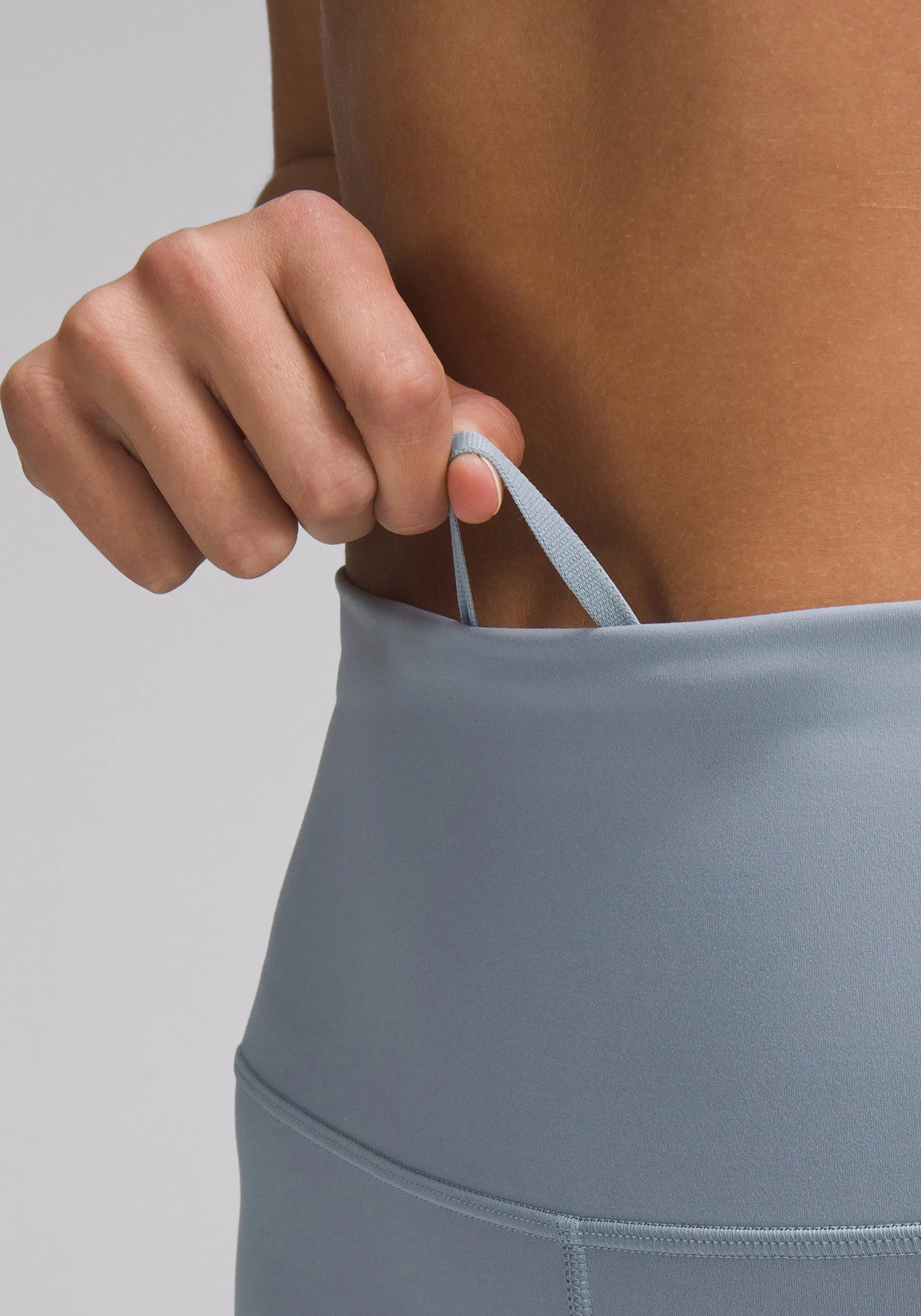 Rib Knit Postpartum Fit Wunder Train High-Rise Tight with Pockets 25"