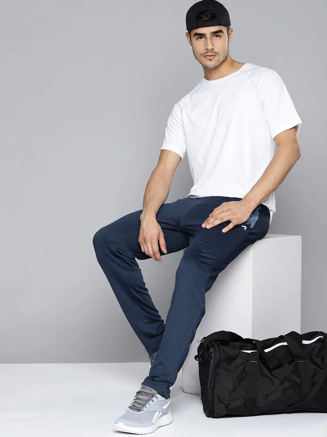 Alcis Men Navy Blue Solid Slim Fit Track Pants with Side Detail Layer Comfort