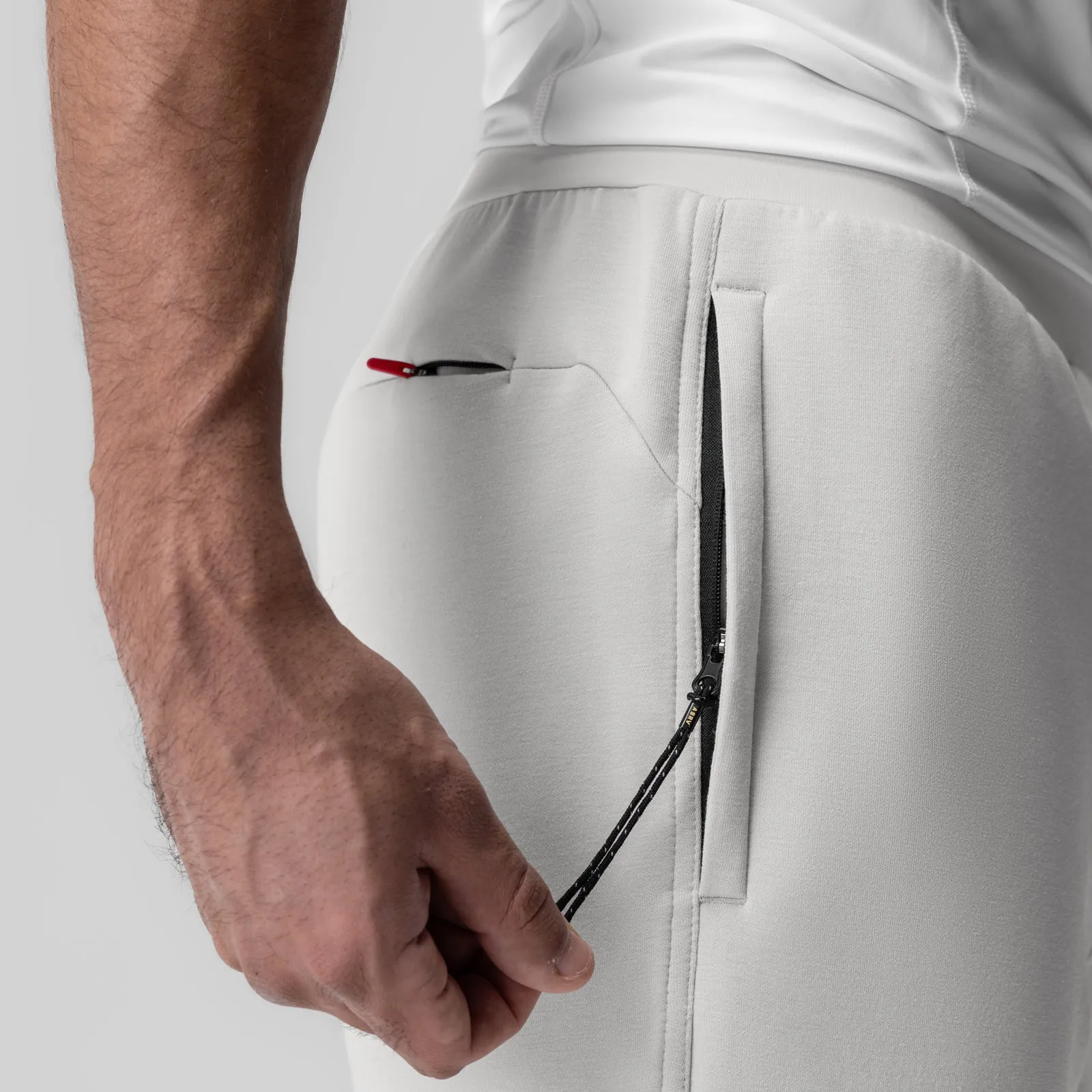WindResistantMaterial 1030. Dri-Core? Training Jogger - Light Grey