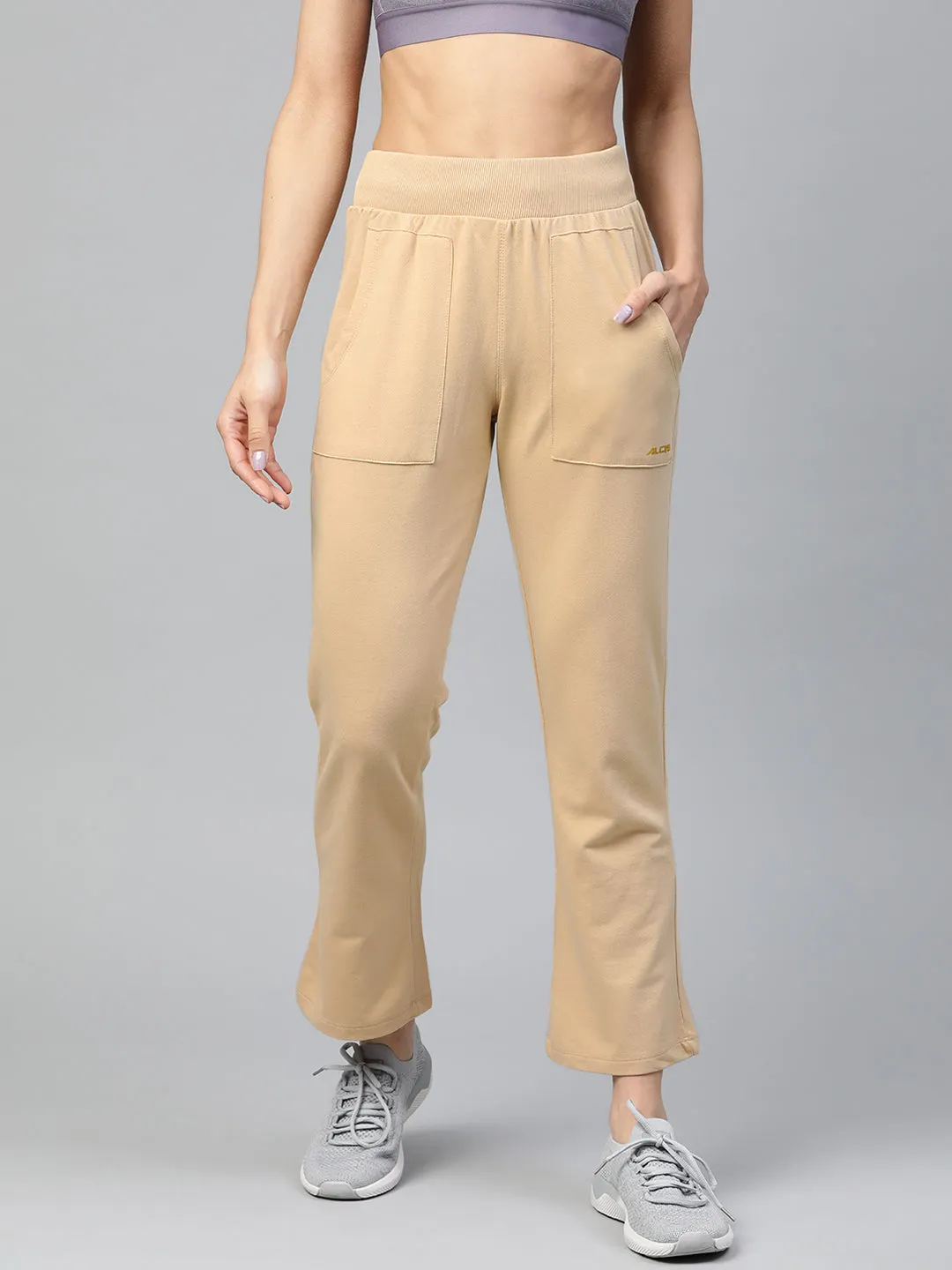 Simple Silhouette Seamless Technology Alcis Women Beige Straight Fit Solid Outdoor Joggers