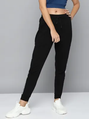 TaglessComfort Alcis Women Black Solid Slim-Fit Training Joggers with Side Taping