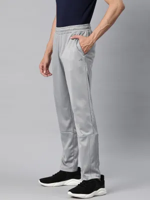 WindproofLayer Alcis Men Solid Slim Fit Sports Track Pants