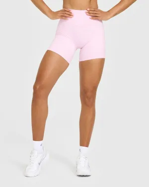 Unified High Waisted Shorts 6" | Chalk Pink Compression Support Zone Form Fitting Flexible Motion