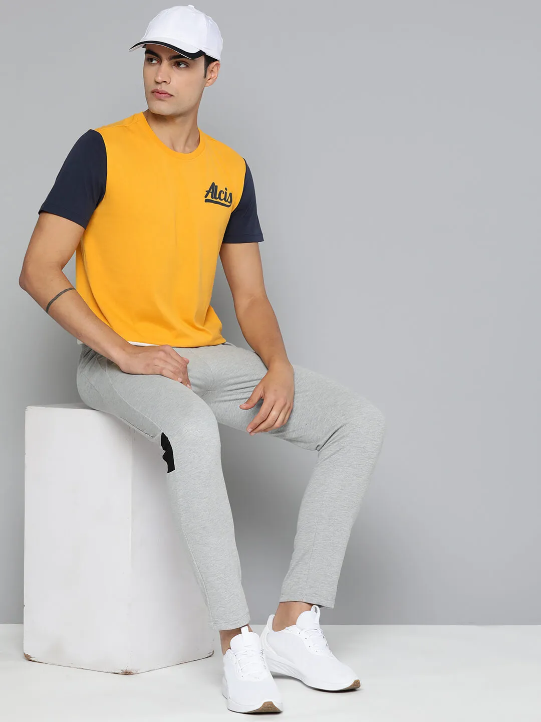 Alcis Men Yellow White Colourblocked Dry Tech Slim Fit Sports T-shirt DurableWeave NonIrritating Seams