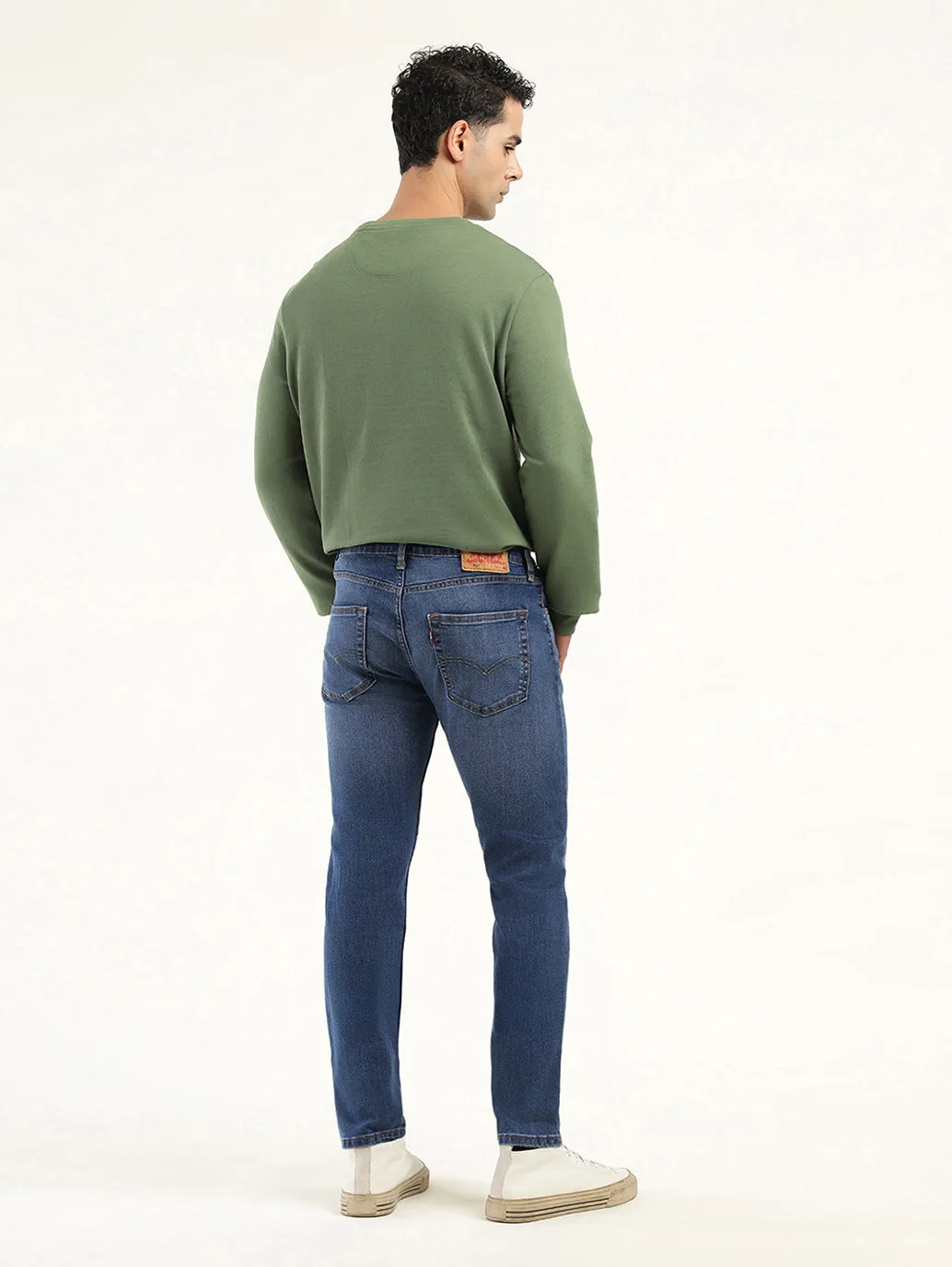 Men's 512 Indigo Slim Tapered Fit Mid Rise Jeans Active Outfit