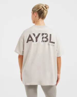 High Density Weave Lift Graphic Oversized T Shirt - Beige Mid-rise fit