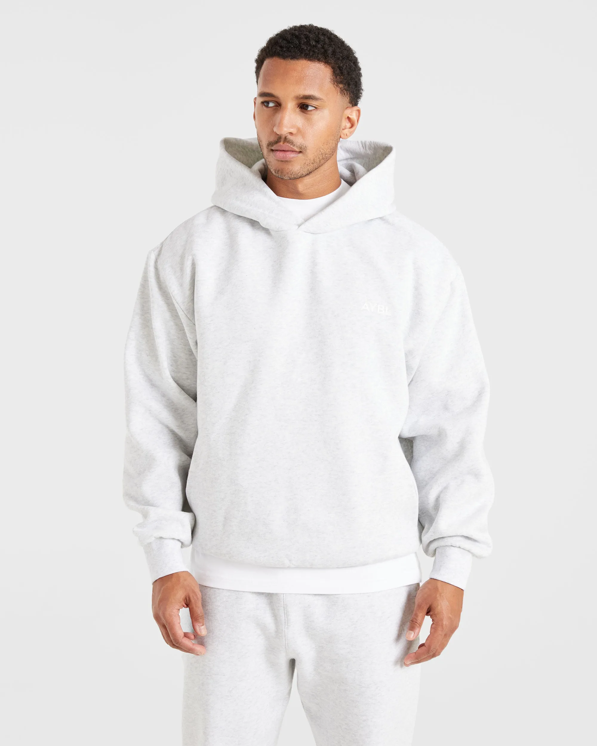 Essential Oversized Hoodie - Grey Marl Outdoor Scene